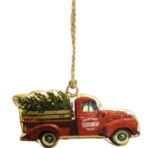 Weihnachtsbaumschmuck in Form eines Lastwagens mit Weihnachtsbaum