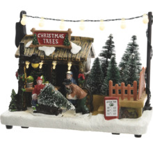 Beleuchtete Weihnachtsdekoration mit Weihnachtsbaumverkaufsszene