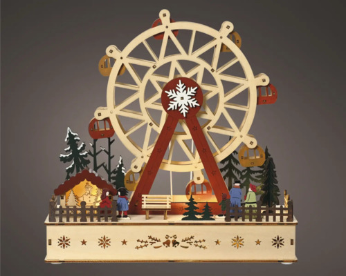 Dekorative, hölzerne Jahrmarkt-Szene mit Riesenrad, Bäumen und Figuren