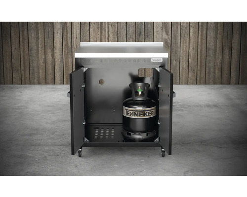 Barbecue à gaz avec portes ouvertes et bouteille de gaz à l''intérieur