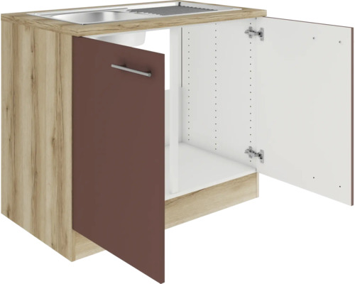 Meuble sous-évier avec porte ouverte et évier