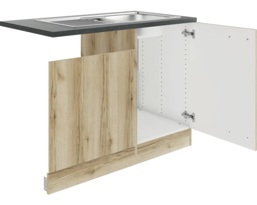 Meuble bas d''évier avec porte ouverte et plan de travail
