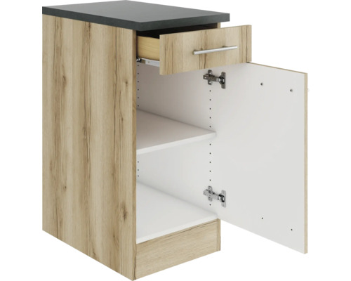 Meuble bas de cuisine avec tiroir, étagère et porte ouverte