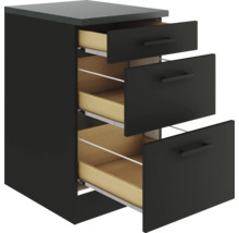 Schrank mit drei offenen Schubladen