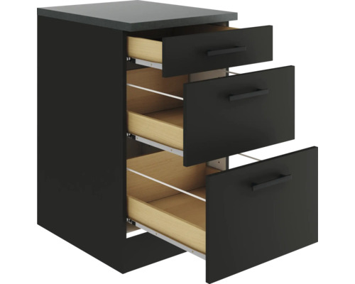 Armoire avec trois tiroirs ouverts