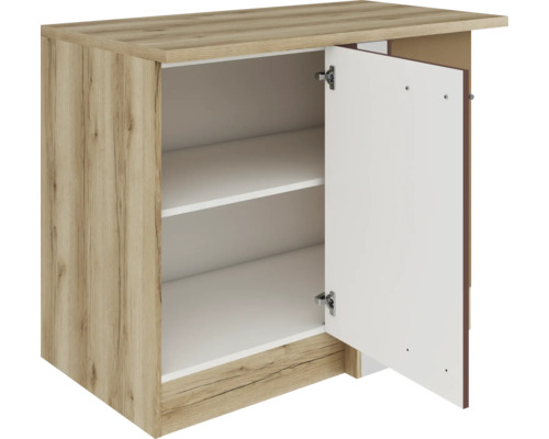 Meuble bas avec porte ouverte et deux étagères