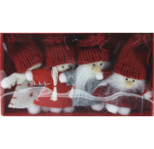 Weihnachtsdekoration mit vier Zwergenfiguren in einer Box