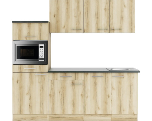 Küchenzeile mit Mikrowelle, Arbeitsplatte und Spüle