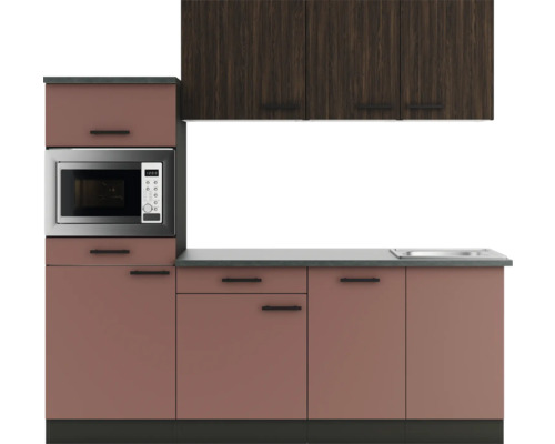 Küchenzeile mit Mikrowelle, Spüle und Schränken