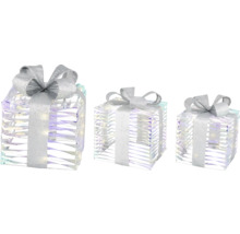 Drei dekorative, durchsichtige Geschenkboxen mit Schleife für die Weihnachtsdekoration.