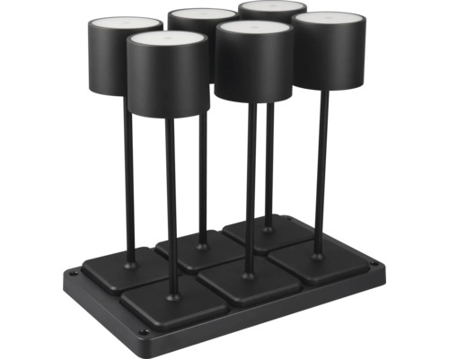 Six bougeoirs noirs pour bougies piliers sur une base noire