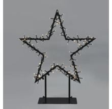 Étoile décorative avec lumières sur un socle
