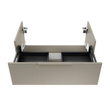 Meuble sous-lavabo avec système de tiroirs ouverts pour salle de bains