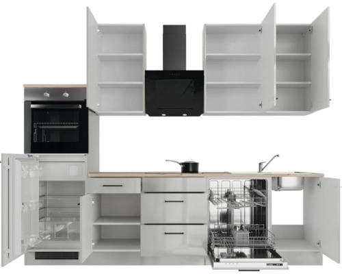 Cuisine complète avec appareils, comprenant un réfrigérateur, un four, un lave-vaisselle et une hotte aspirante.