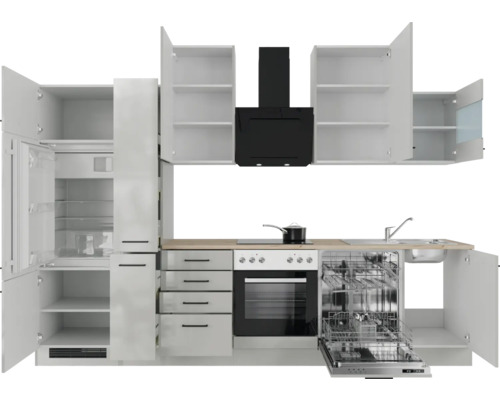 Cuisine moderne avec armoires blanches, hotte noire et appareils intégrés