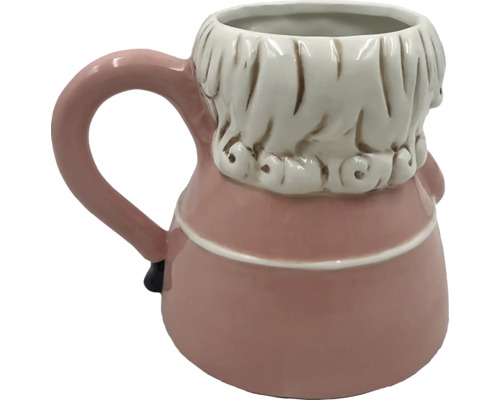 Tasse en céramique en forme de figurine avec une poignée
