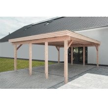 Carport en bois avec toit plat sur surface pavée