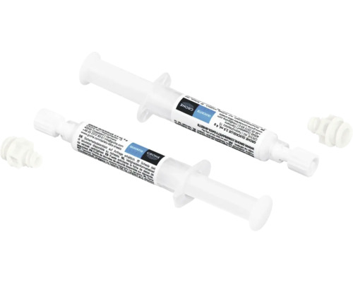 Zwei Grohe QuickGlue Klebstoffspritzen mit Verschluss