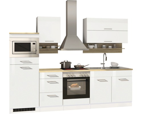 Cuisine équipée avec micro-ondes, hotte aspirante, plaque de cuisson et four