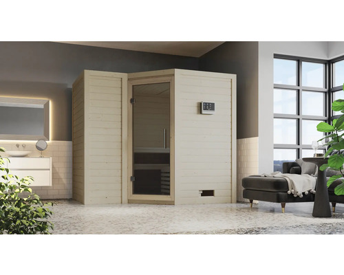 Sauna avec porte en verre et éléments de commande dans une salle de bain claire