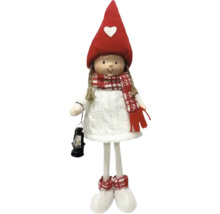 Dekofigur eines Mädchens mit Laterne für die Weihnachtszeit