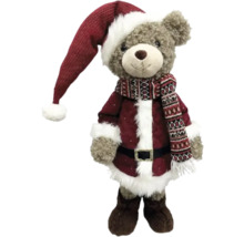 Ours en peluche déguisé en Père Noël avec bonnet, manteau et écharpe