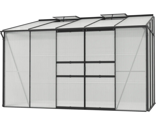 Serre avec fenêtres de toit et gouttière