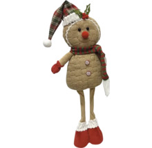Poupée en tissu bonhomme en pain d’épices avec bonnet et écharpe comme décoration de Noël
