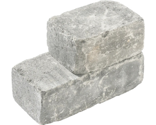 Zwei graue Pflastersteine gestapelt.