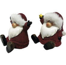Deux figurines de Père Noël avec bonnet et barbe