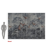 Papier peint photo avec un motif de flamants roses volant devant des arbres