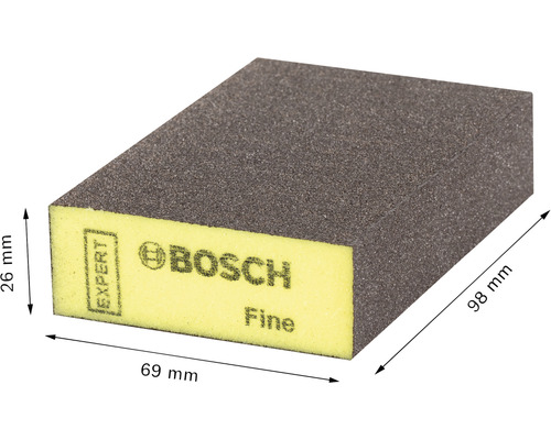 Éponge abrasive à grain fin mesurant 98 mm x 69 mm x 26 mm.