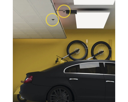 Garage avec porte sectionnelle, motorisation de porte de garage et vélos